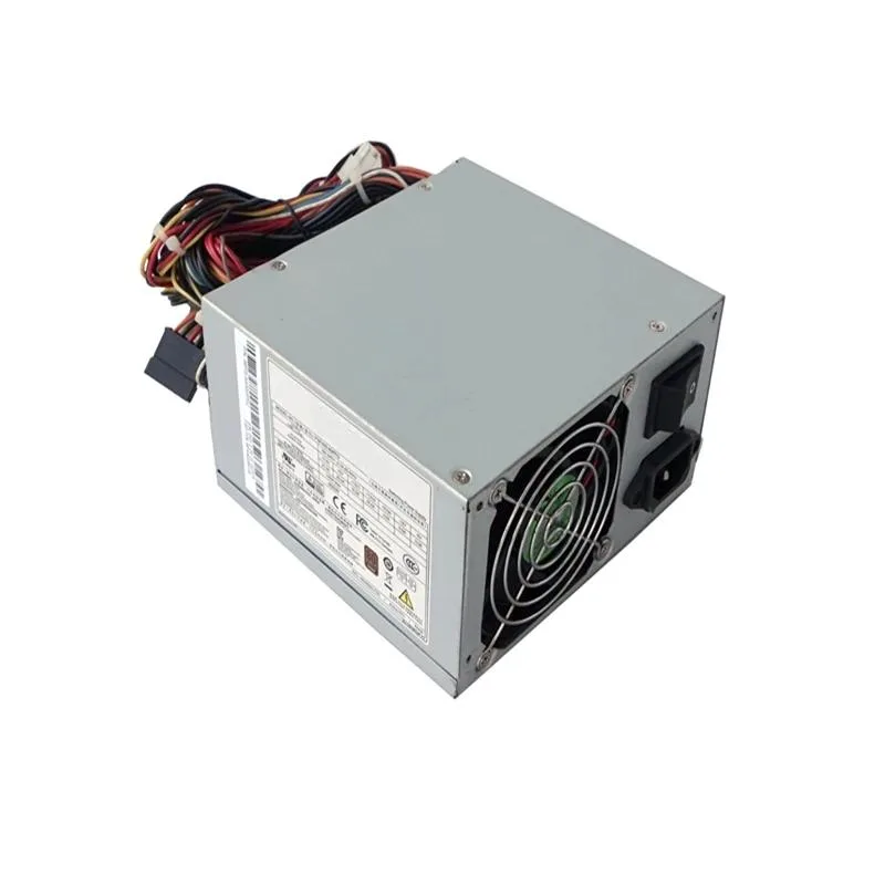 Rectangular metal ATX power supply unit with cooling fan and cable bundle