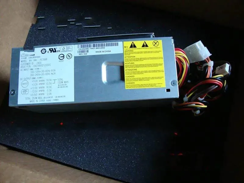 Rectangular ATX power supply unit in metal casing