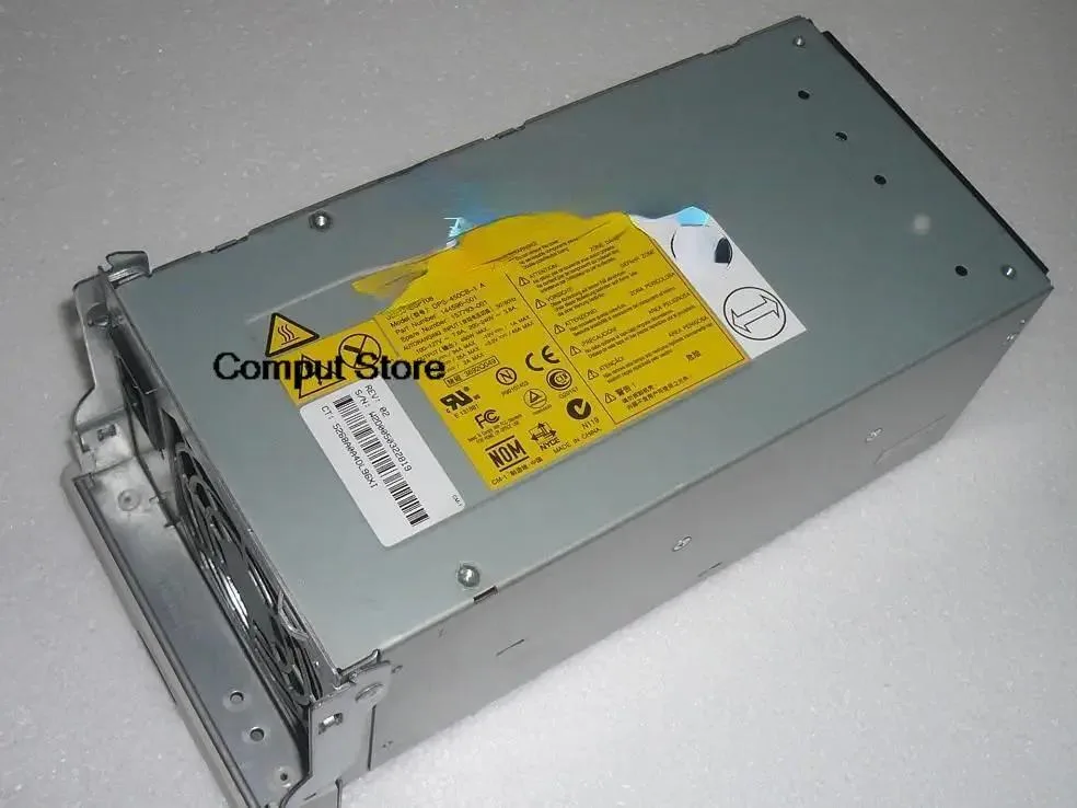 Rectangular metal ATX power supply unit with ventilation grille and label
