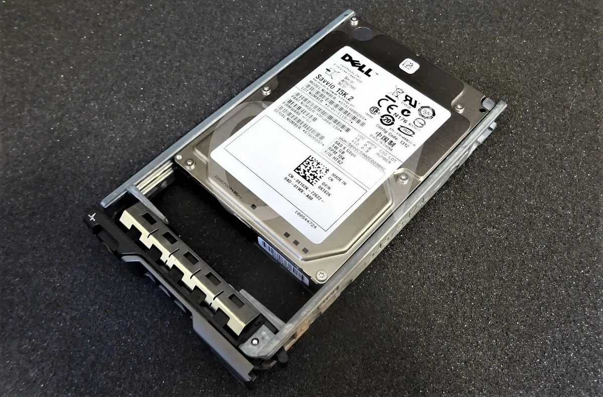 Small silver 2.5 inch hard drive with SAS connector and Dell label