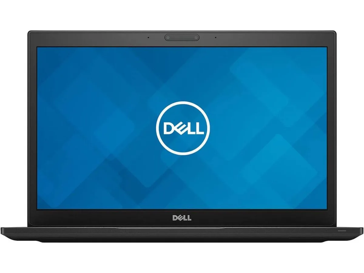 Silver Dell Latitude 7490 laptop beside Kensington LD4650P USB-C dock