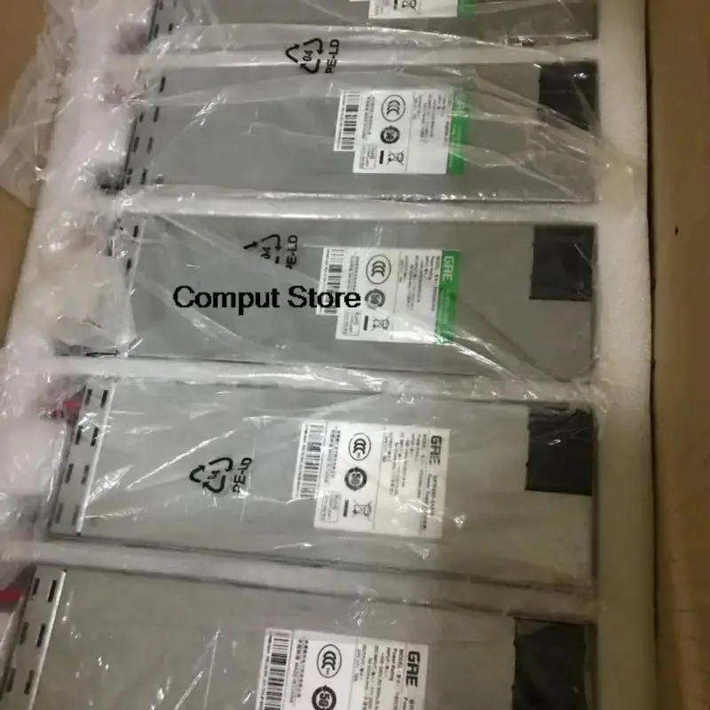 Rectangular black metal ATX power supply unit with rear fan grille and power socket