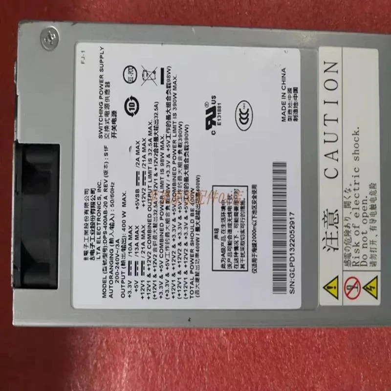 Silver 1U ATX power supply unit with rear fan grille and power socket