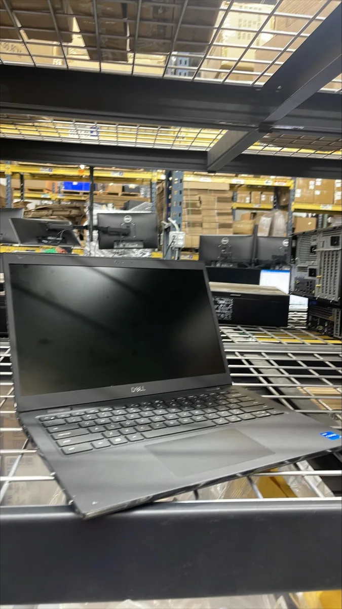 Black Dell Latitude 3420 14 inch laptop, non-touch HD screen, visible scratches on lid