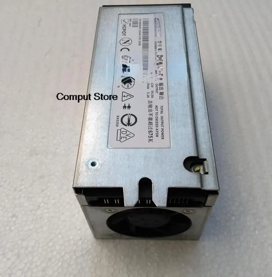 Rectangular silver ATX power supply unit with fan grille and power connectors