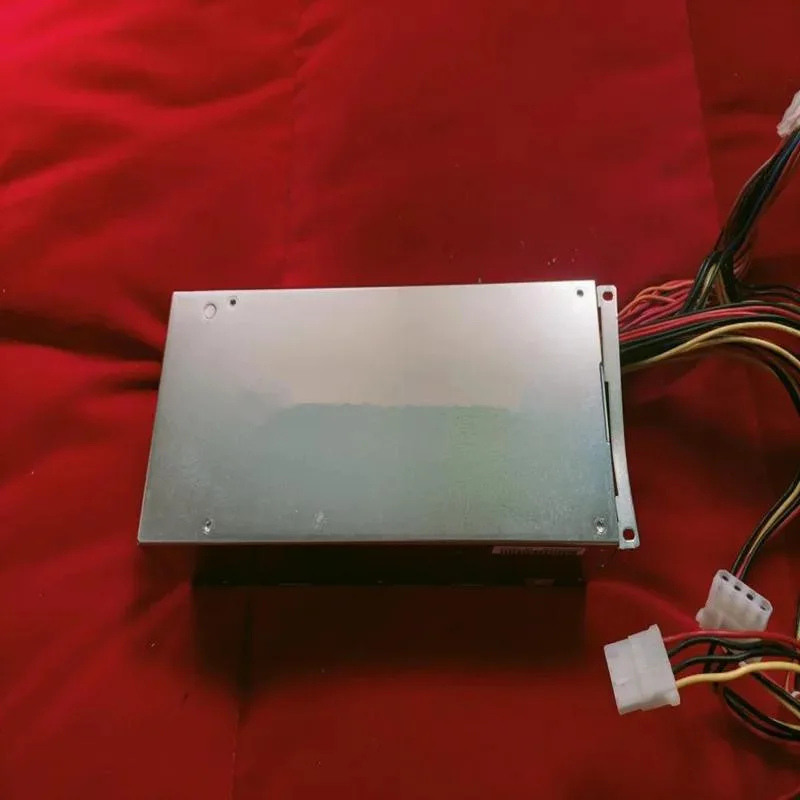 Rectangular ATX power supply unit with matte black finish and cooling fan grille