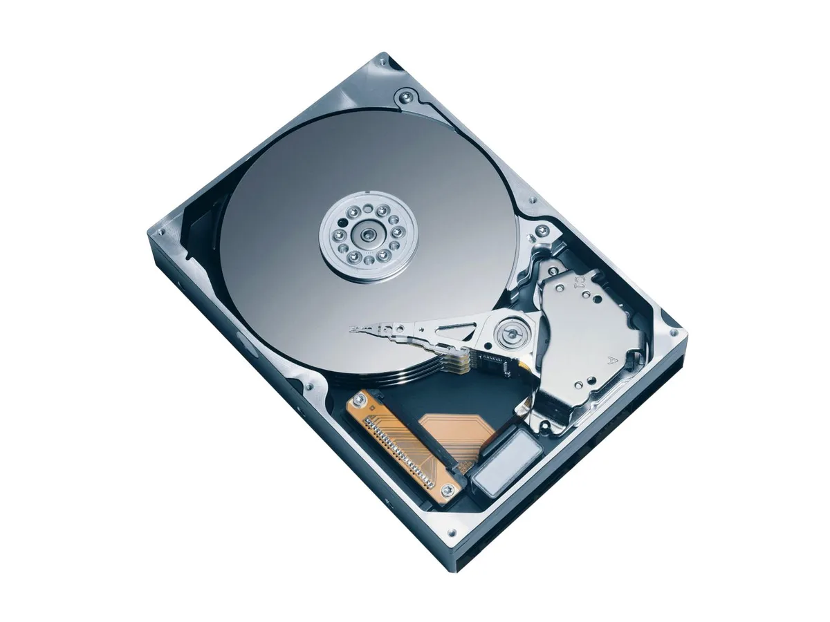 Silver 3.5 inch bare hard drive with IDE connector and circuit board visible