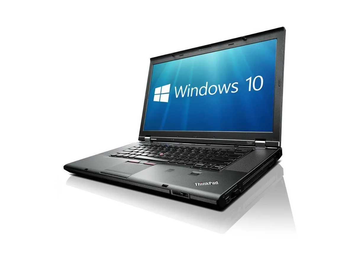 Black 15.6-inch ThinkPad T530 laptop showing heavy wear