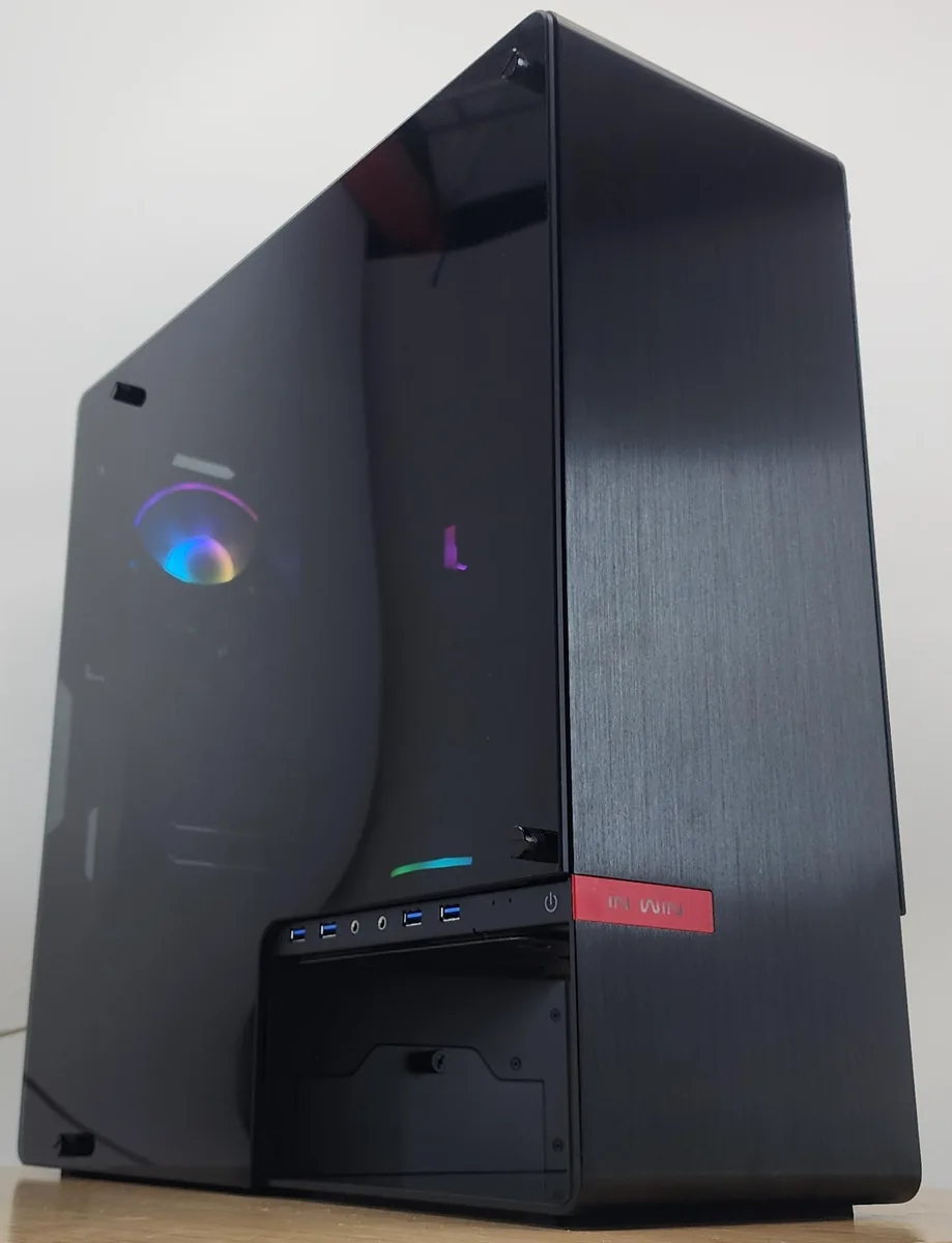 Silver INWIN 904 ATX mid-tower gaming desktop with side panel window showing Asetek 120mm AIO cooler and RGB memory