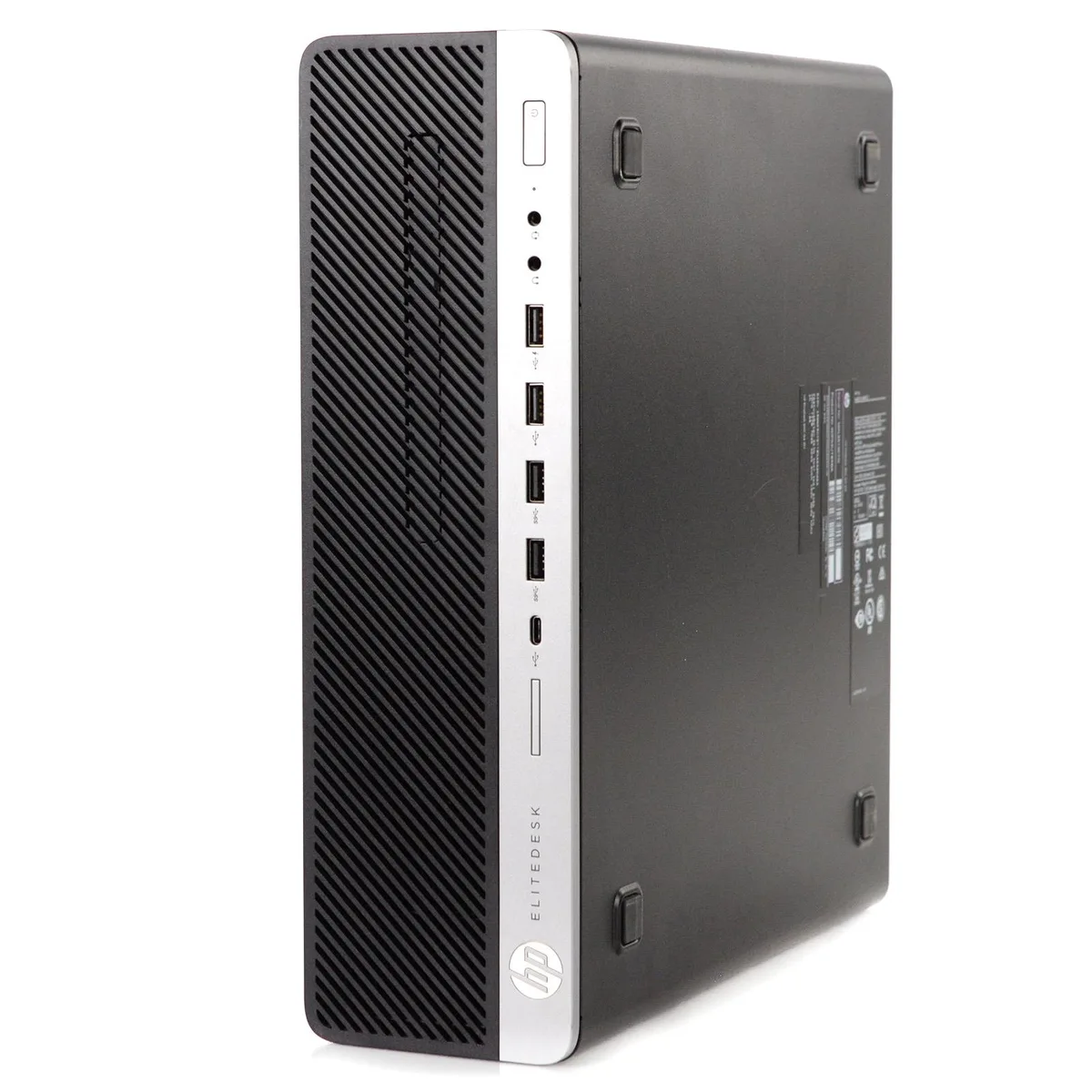 Compact silver small-form-factor desktop tower with front panel ports and ventilation slots