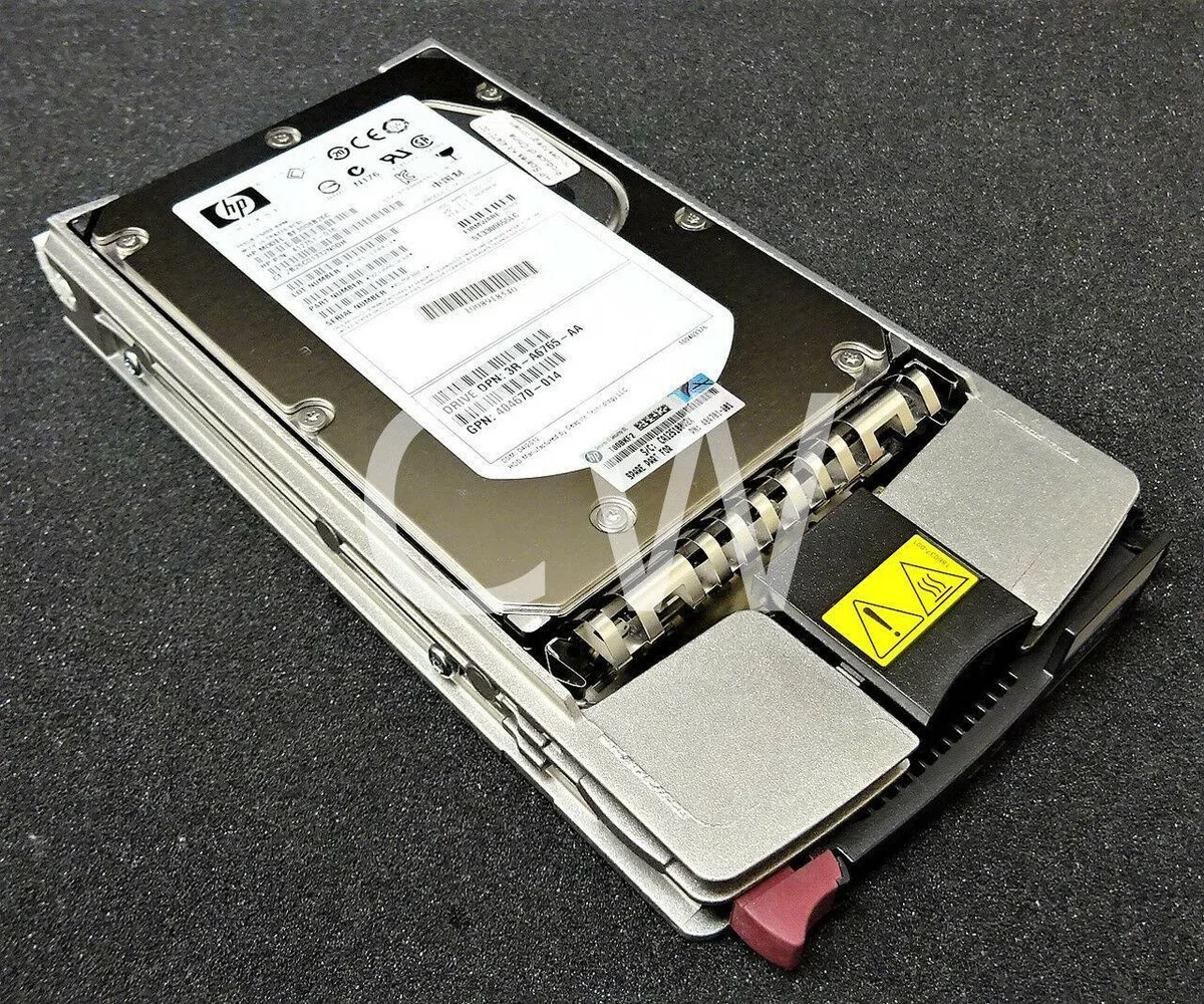 Silver 3.5 inch SCSI hard drive with black 80-pin connector and silver mounting caddy