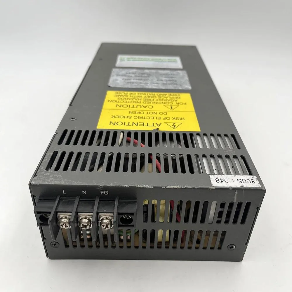 Rectangular ATX power supply unit, matte metal casing, label shows 48VDC 16.6A