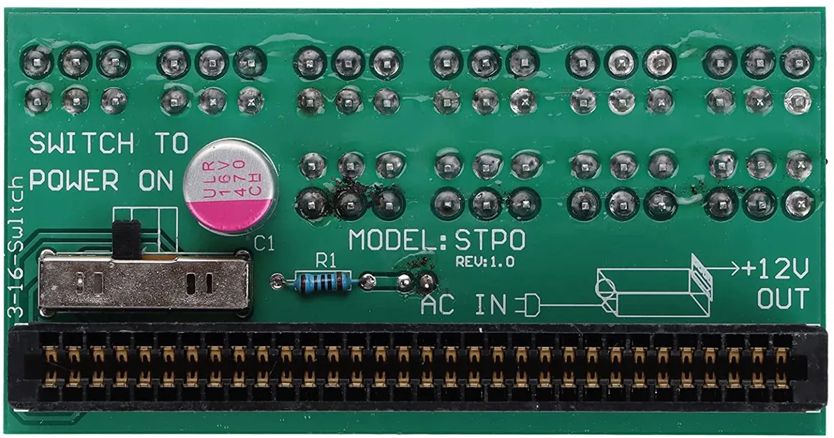 Green PCB board with ten 6-pin connectors and gold finger edge connector