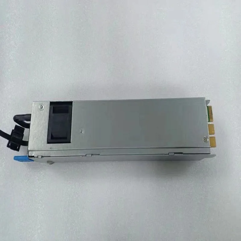 Rectangular silver metal power supply unit with rear fan grille and modular cable sockets