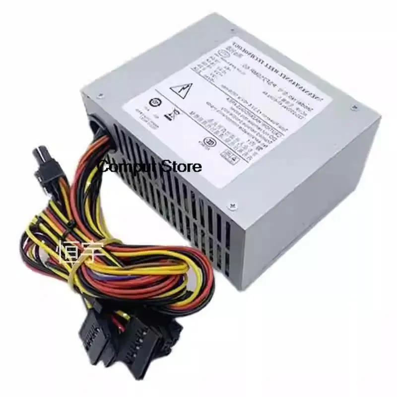 Rectangular metal ATX power supply unit with serial port connections