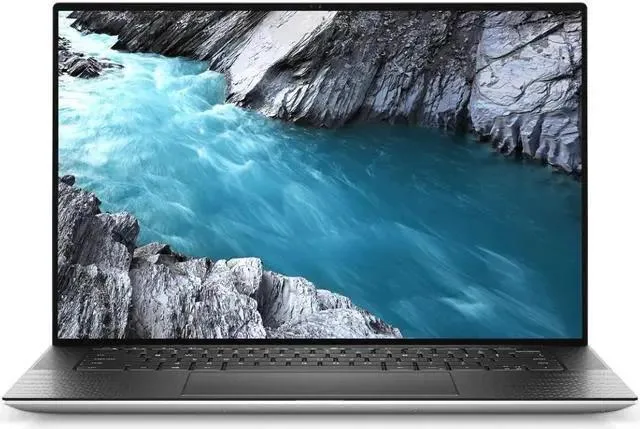 Silver Dell XPS 15 9500 laptop closed view showing platinum silver lid and carbon fiber black interior