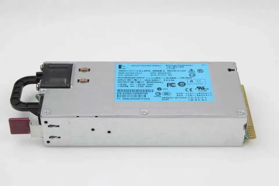 Rectangular silver server power supply unit with rear fan grille and power connector