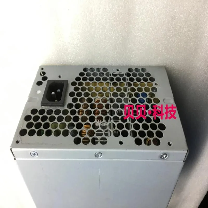 Rectangular silver ATX power supply unit with ventilation grille and label showing 650W