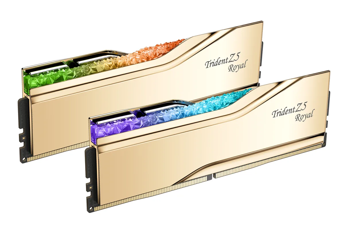 Two gold DDR5 modules with crystalline RGB light bars and mirrored aluminium heatspreaders