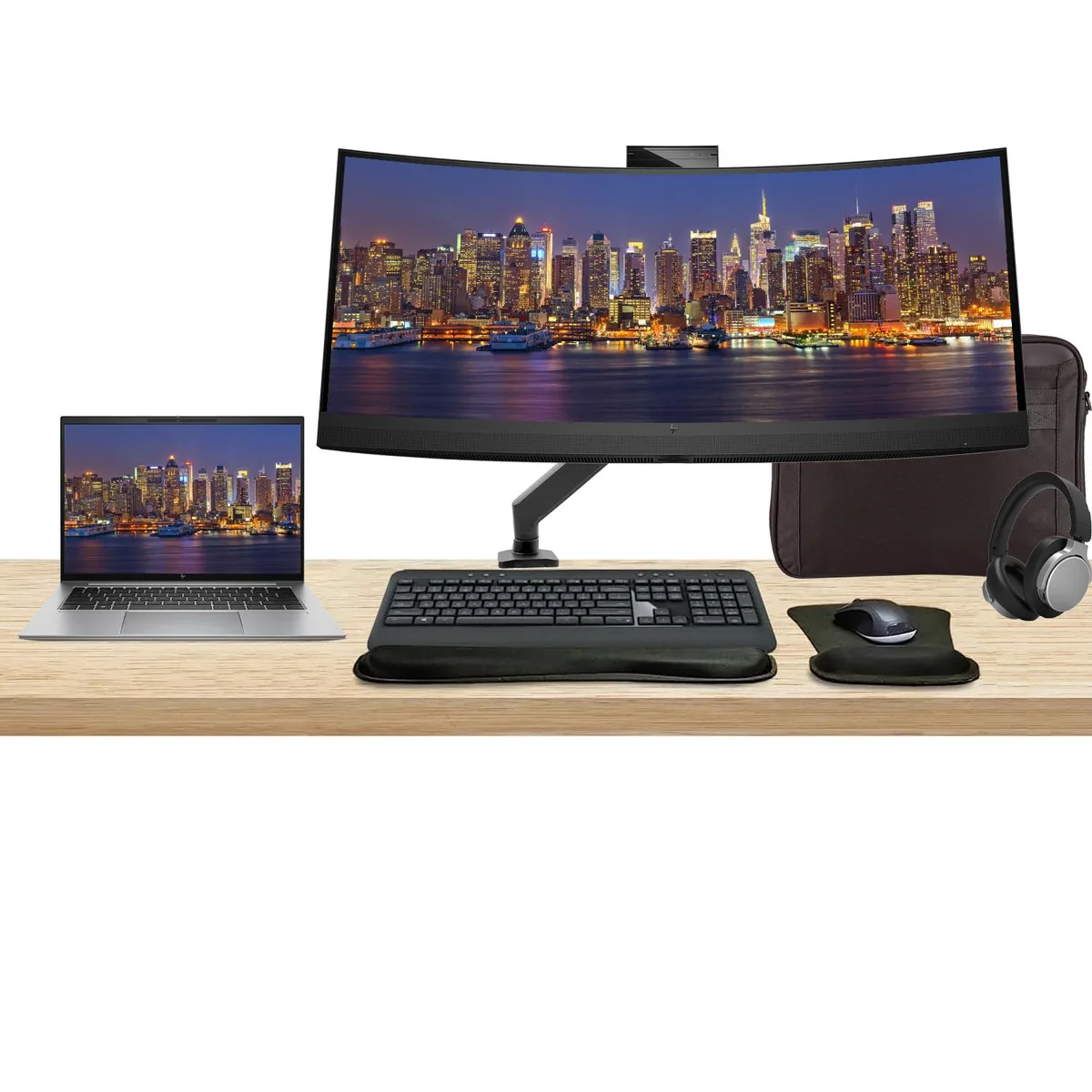 Silver 14 inch laptop, 34 inch curved monitor, wireless keyboard, mouse, headphones, briefcase, desk mount