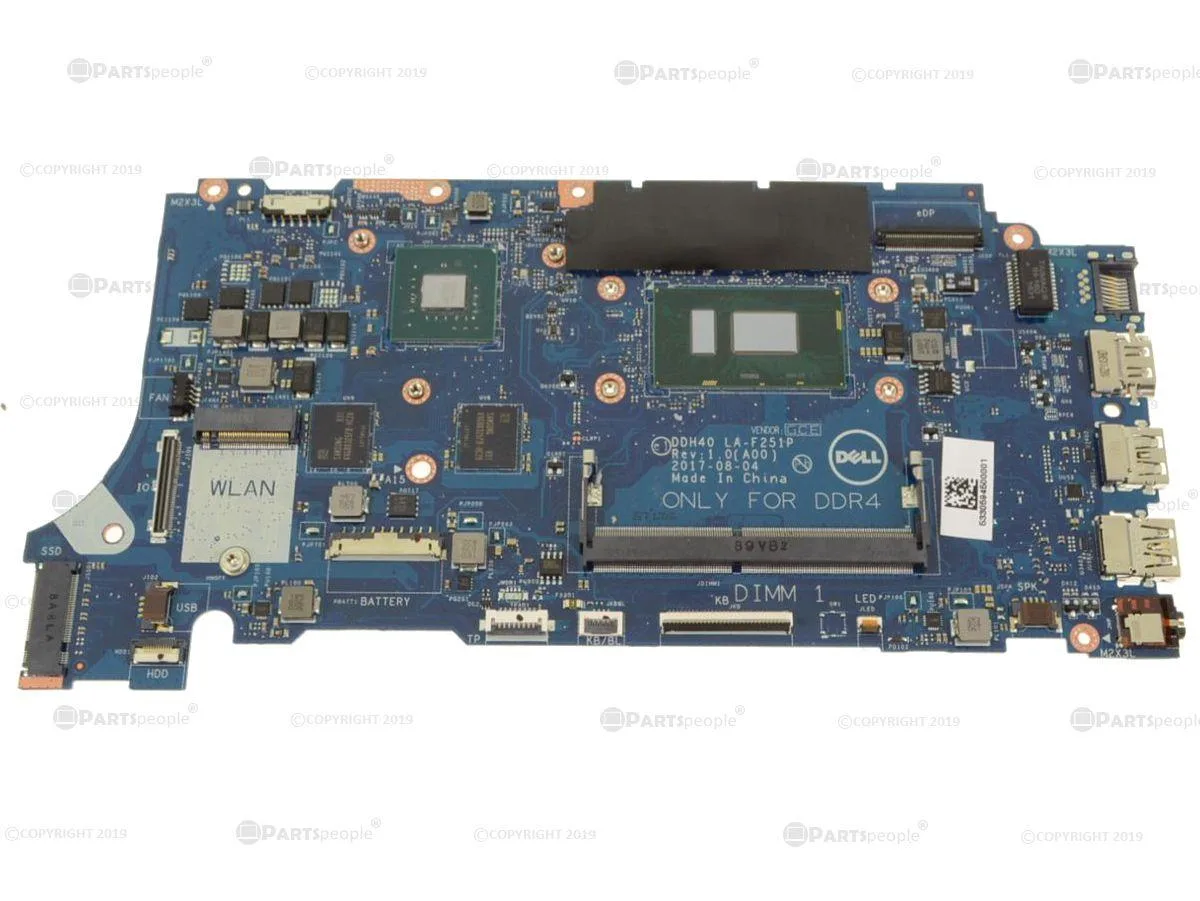 Green Dell laptop motherboard with silver CPU socket and black components