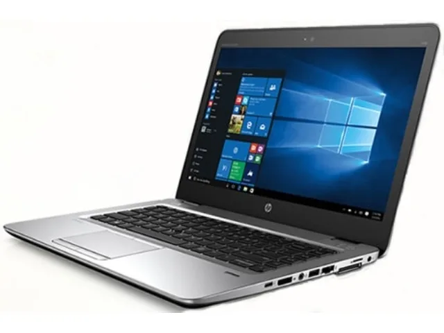 Silver 14 inch laptop, matte lid, open clamshell showing keyboard and screen