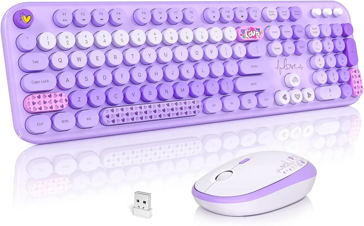 Purple full-size wireless keyboard with round retro keycaps and matching mouse, foldable stand visible