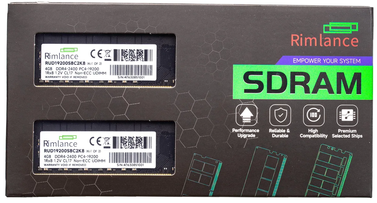 Two green circuit boards with black chips and gold contacts