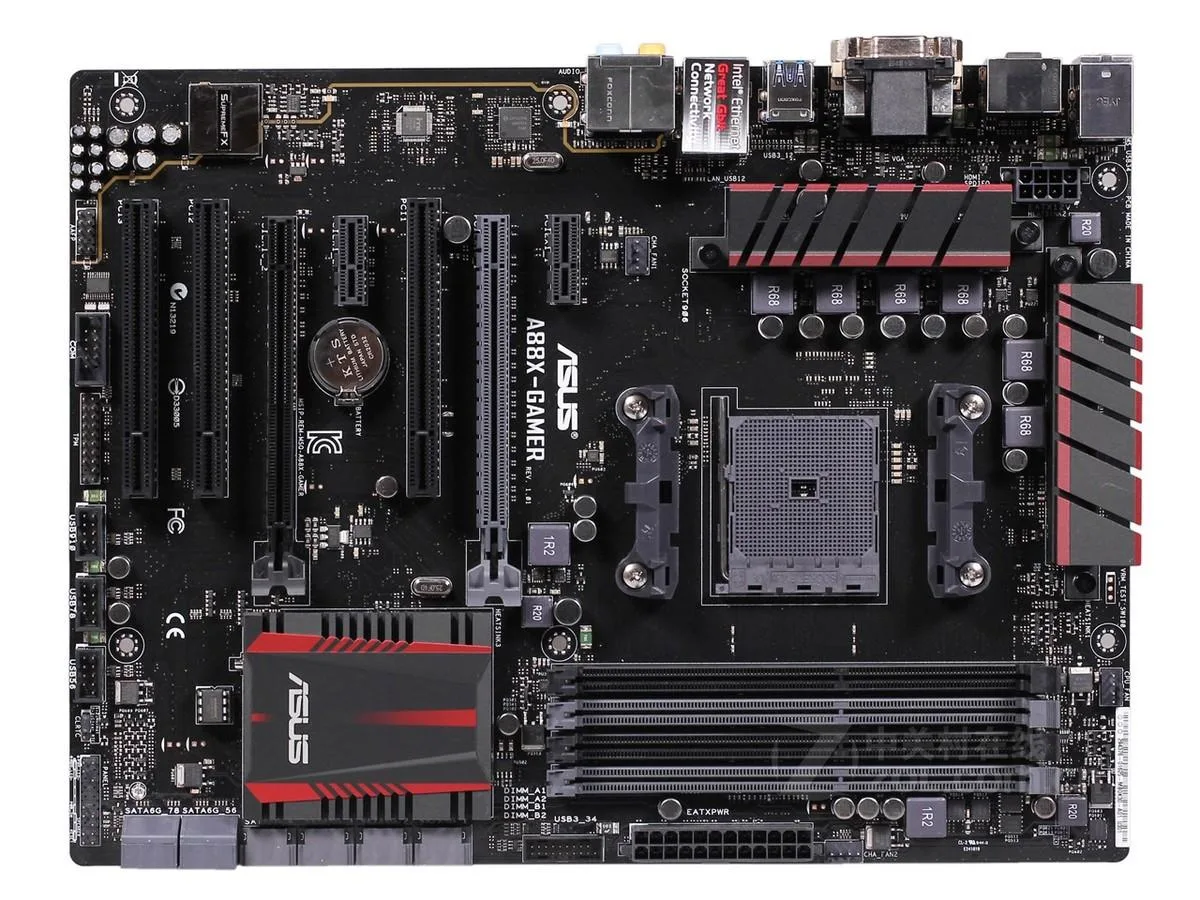 Black rectangular ATX motherboard with silver heatsinks and multiple expansion slots