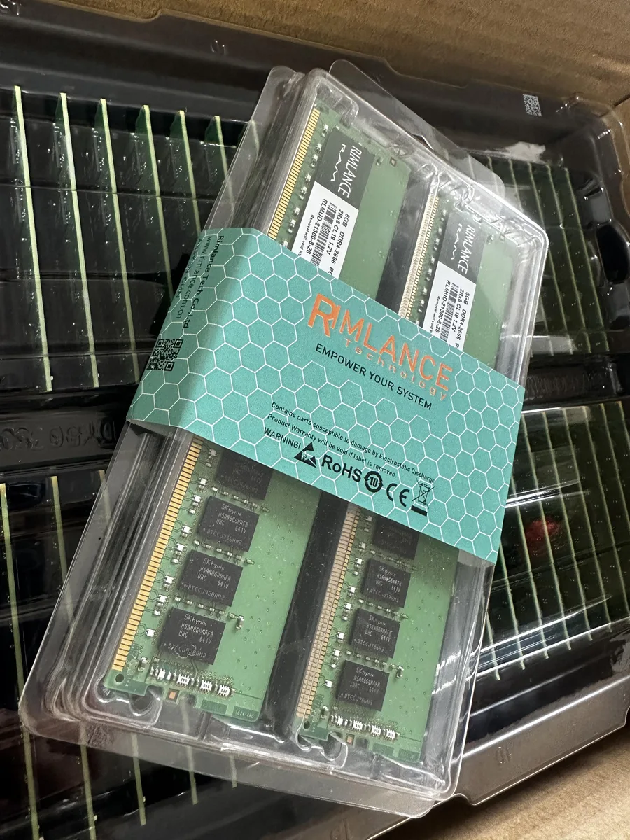 Two green DDR4 memory modules with gold contacts