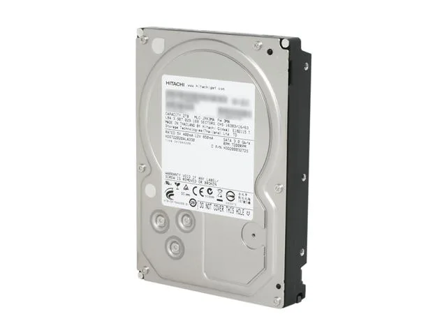 Silver 3.5 inch bare hard drive with circuit board visible