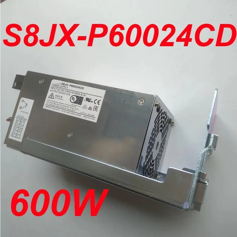 Rectangular metal ATX power supply unit with ventilation grille and label showing 600W 24V 27A