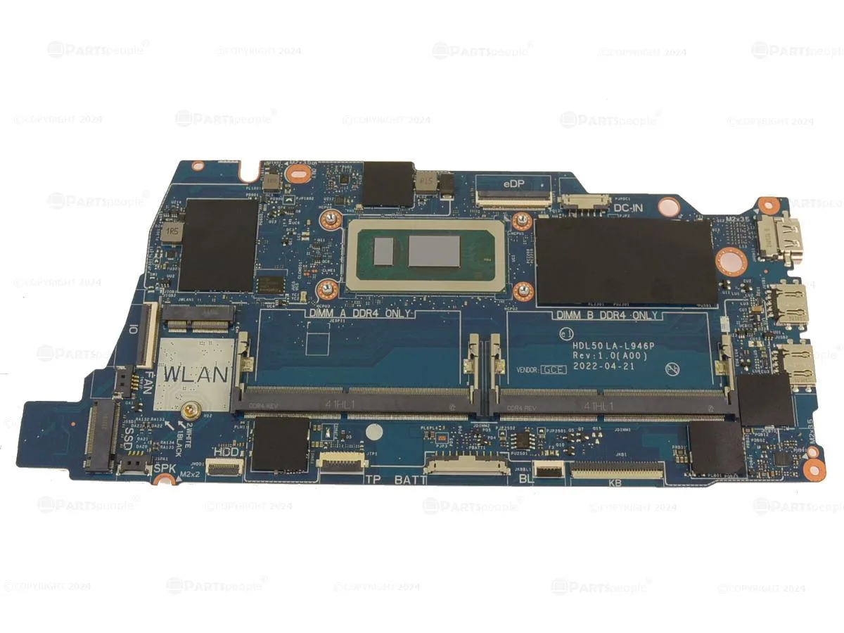 Green Dell laptop motherboard with silver CPU socket and black components