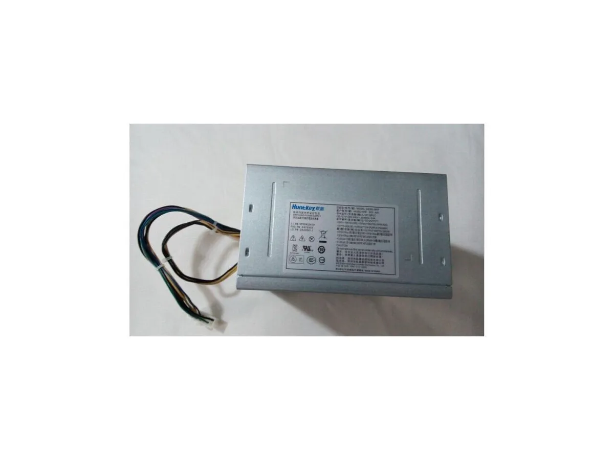 Silver rectangular ATX power supply unit with rear fan grille and cable bundle