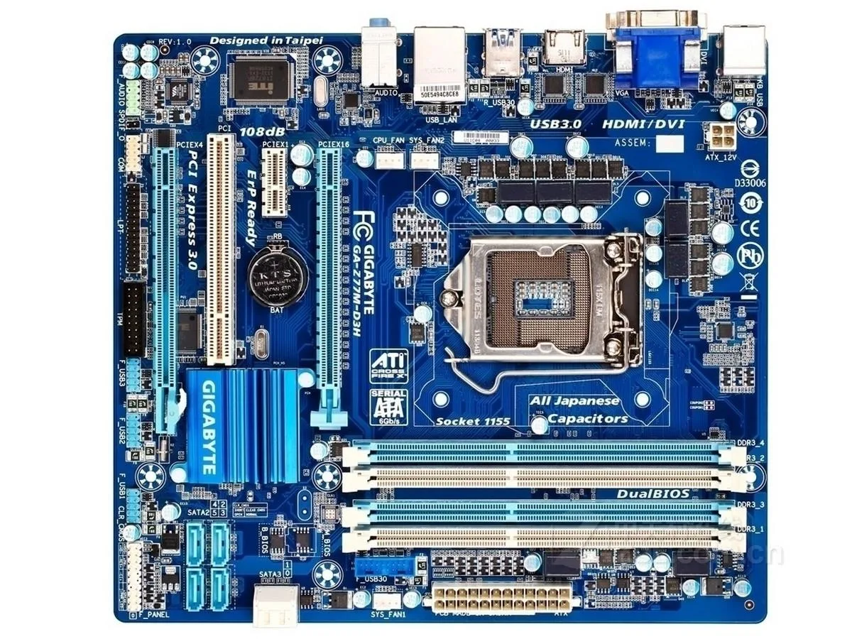 Micro ATX board in matte black with silver heatsinks and four DDR3 slots