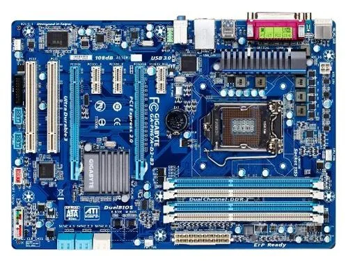 ATX motherboard with black PCB, silver heatsinks, LGA 1155 socket, four DDR3 slots, PCIe x16 slot, rear I/O panel