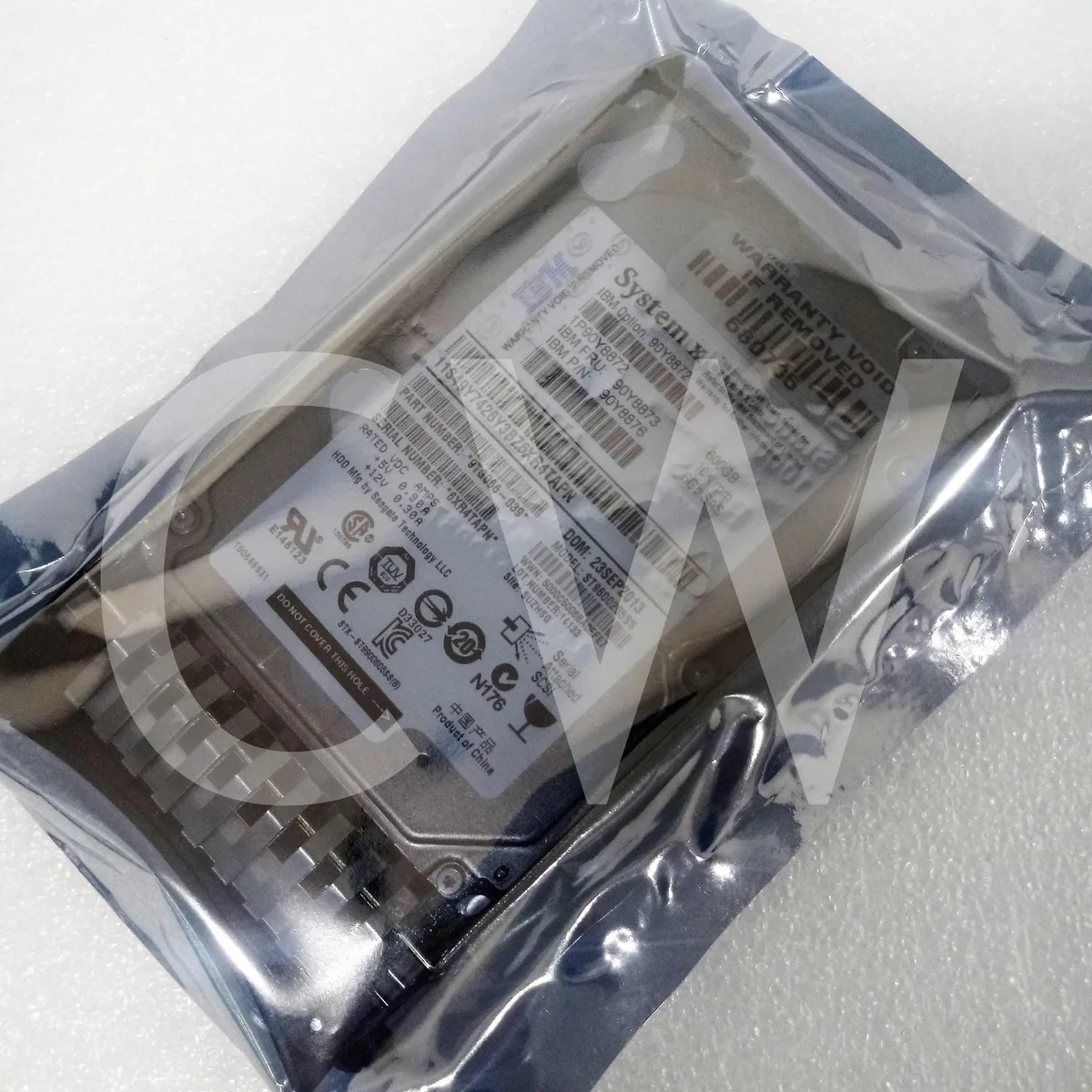 2.5 inch SAS hard drive in silver caddy tray