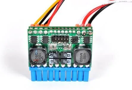 Small rectangular DC-DC ATX power supply with red black white input wires and multiple output connectors