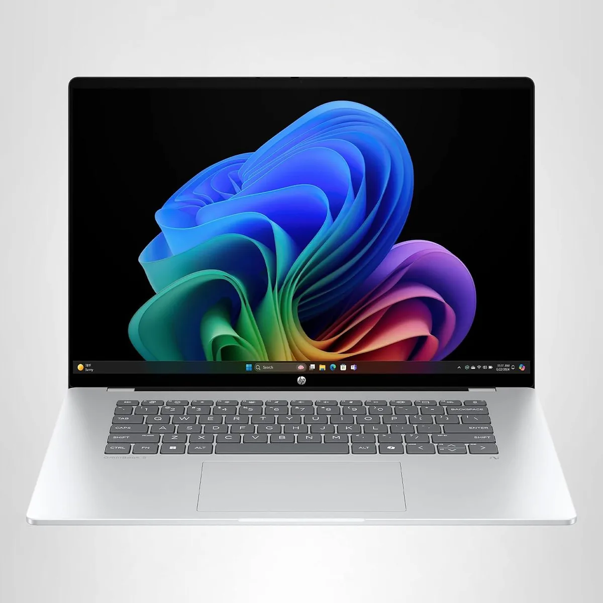 Silver 16 inch laptop with flat keyboard and trackpad