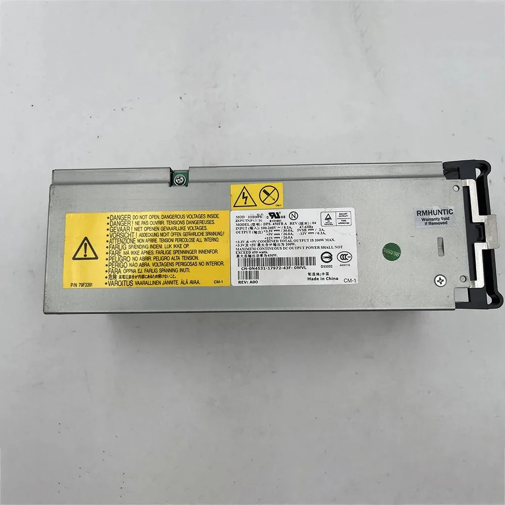 Silver rectangular ATX power supply unit with ventilation grille and label sticker