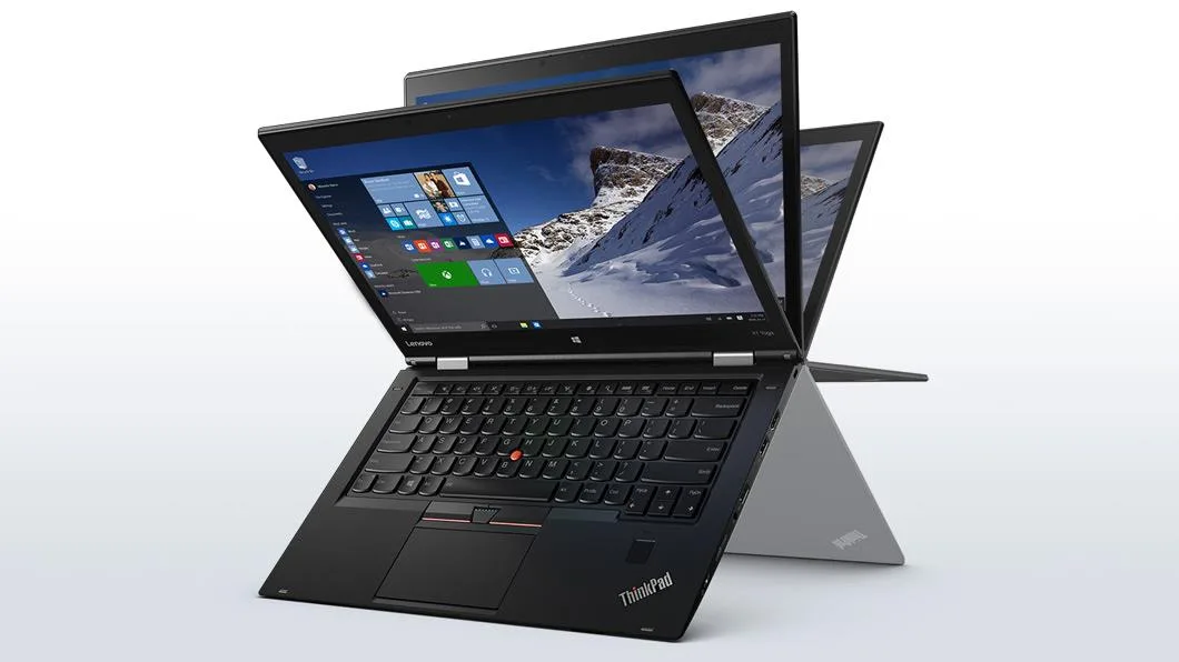Black 14-inch convertible laptop with OLED touchscreen and stylus