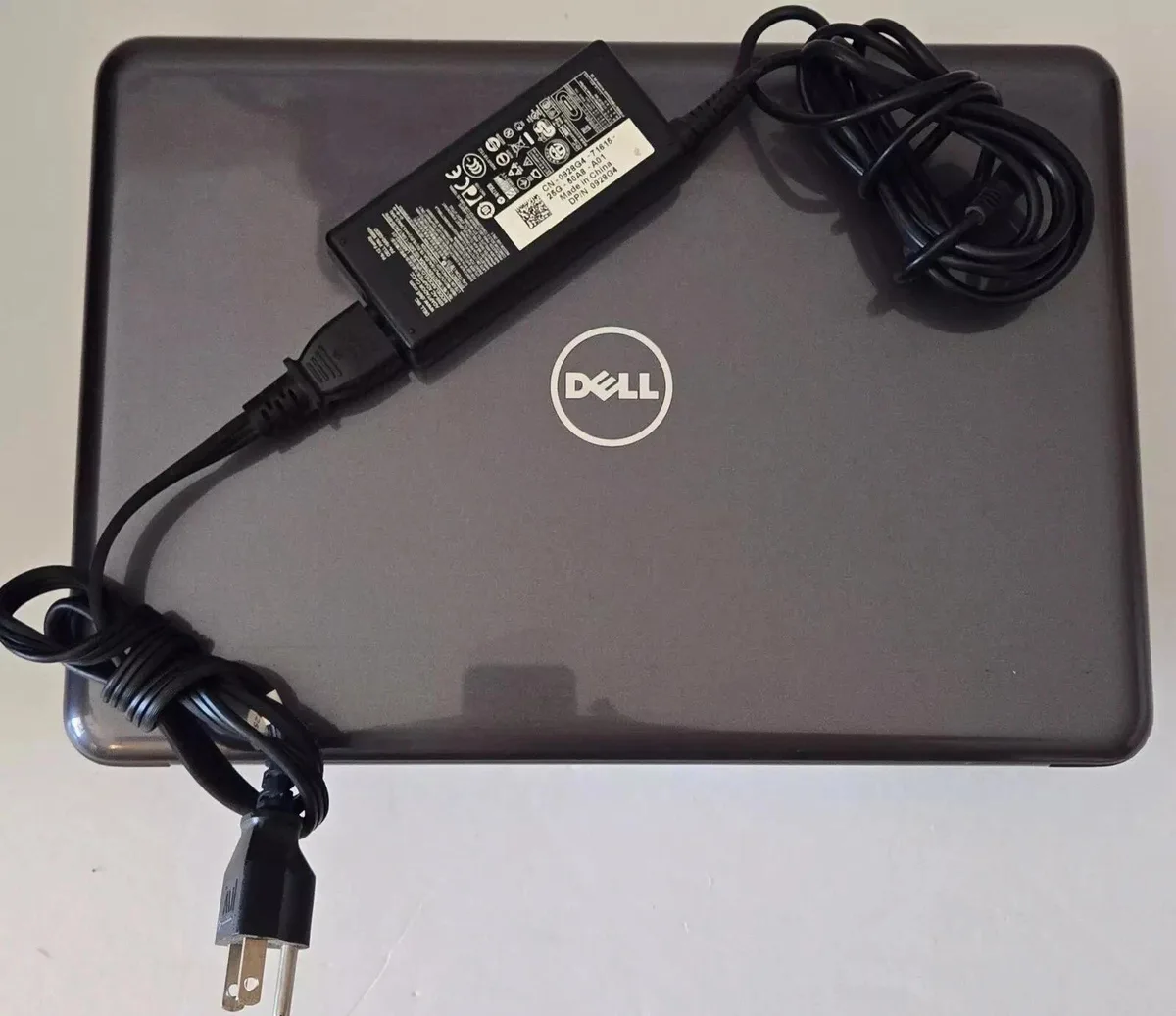Silver Dell Latitude 3380 laptop closed showing 13.3 inch display and keyboard