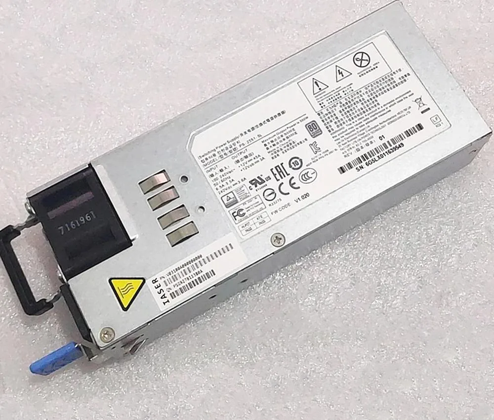 Silver metal rectangular ATX power supply unit with model label visible