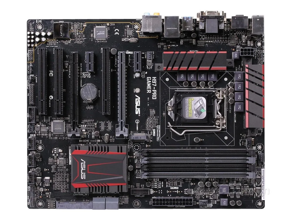 ATX motherboard in black with silver heatsinks and DDR3 slots