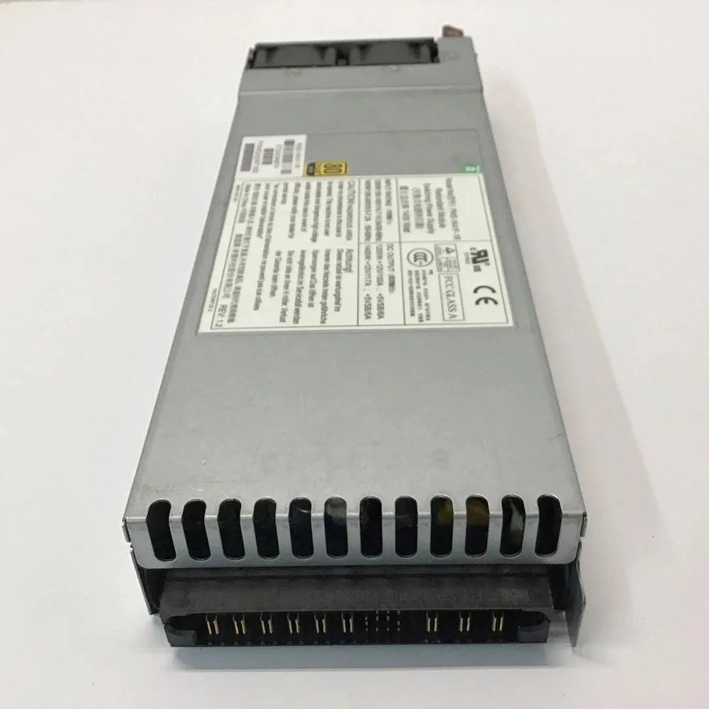 Silver rectangular server power supply unit with rear fan grille and power socket