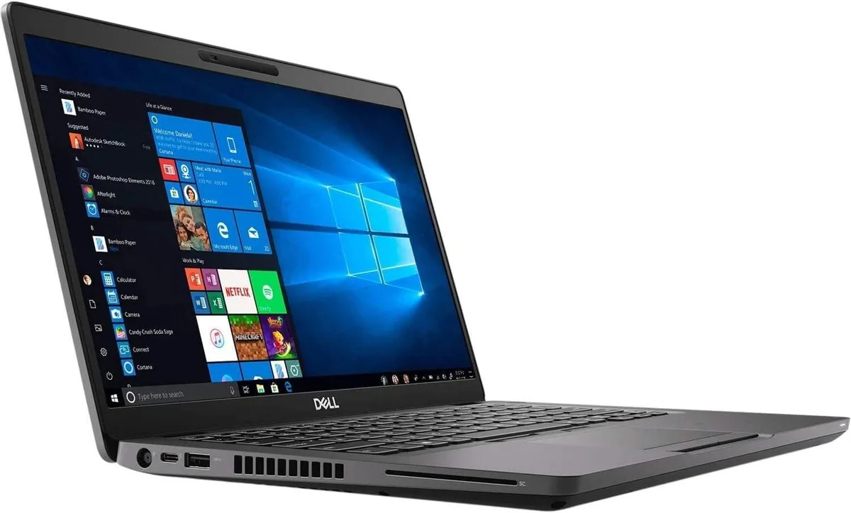 Silver Dell Latitude 5400 14 inch laptop closed on white background