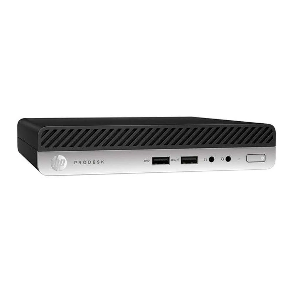 Compact black and silver mini desktop PC with keyboard and mouse