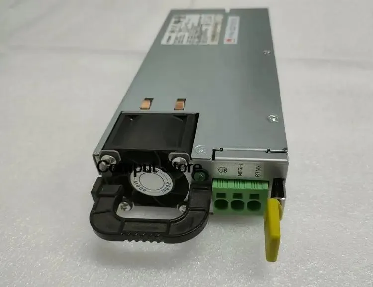 Rectangular silver server power supply unit with ventilation grille and label
