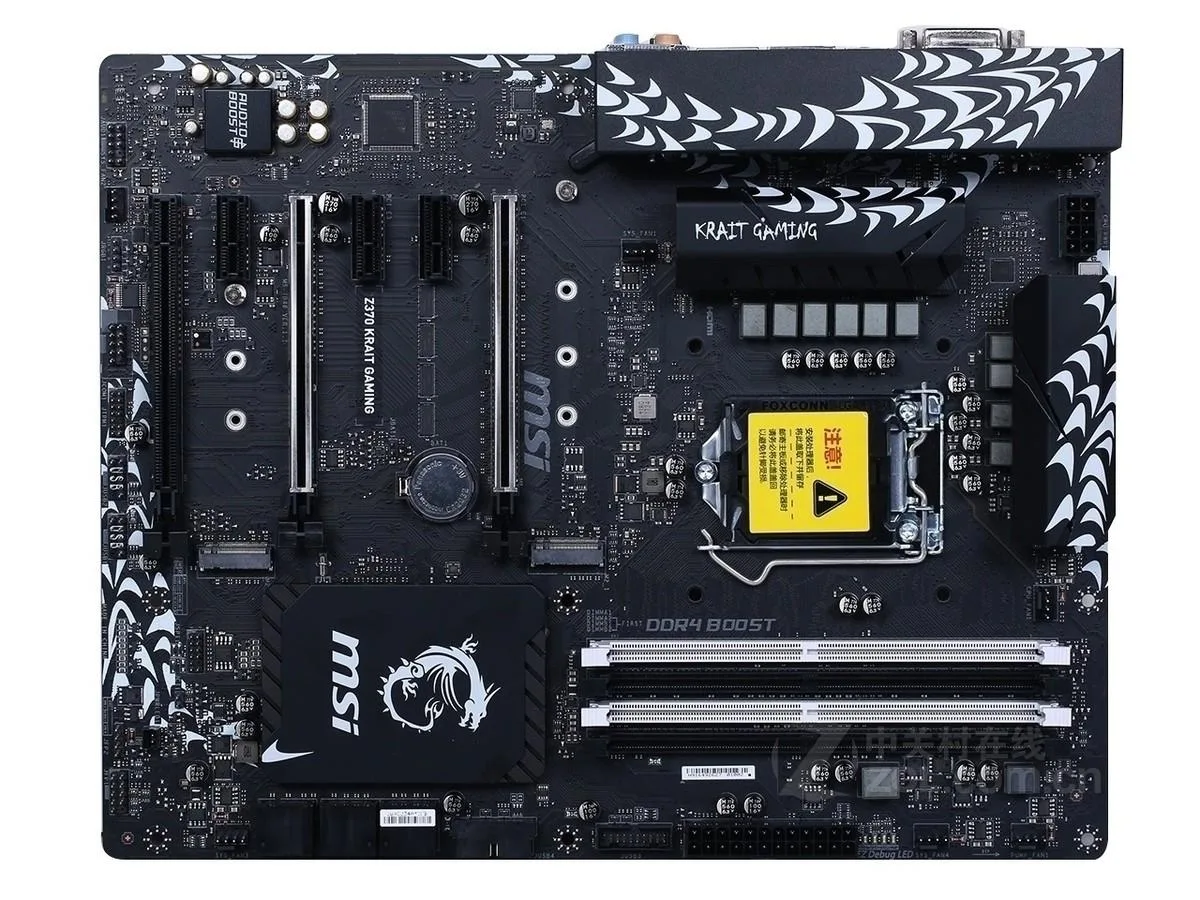 ATX motherboard in black and white with silver heatsinks
