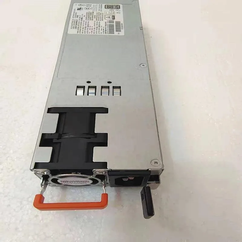Silver rectangular ATX power supply unit with ventilation grille and label showing 1600W rating
